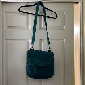 Thirty One convertible bag. Cross body to purse to backpack